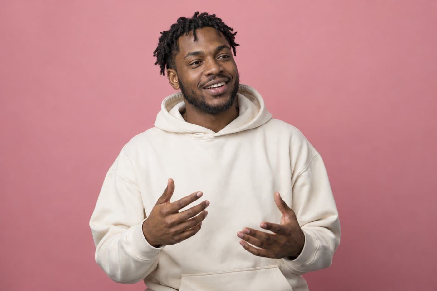 Example person, a man in a cream hoodie.